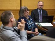 Therapeutic Specialty Courts Coordinator Beth Robinson, center, speaks about the changes to veterans court June 10 in Clark County District Court.