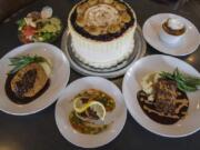 Steve’s Homemade Meatloaf with green beans, counterclockwise from left, is served with Dungeness crab cakes, country fried steak, creme brulee and huckleberry cake at DuckTales Kitchen.