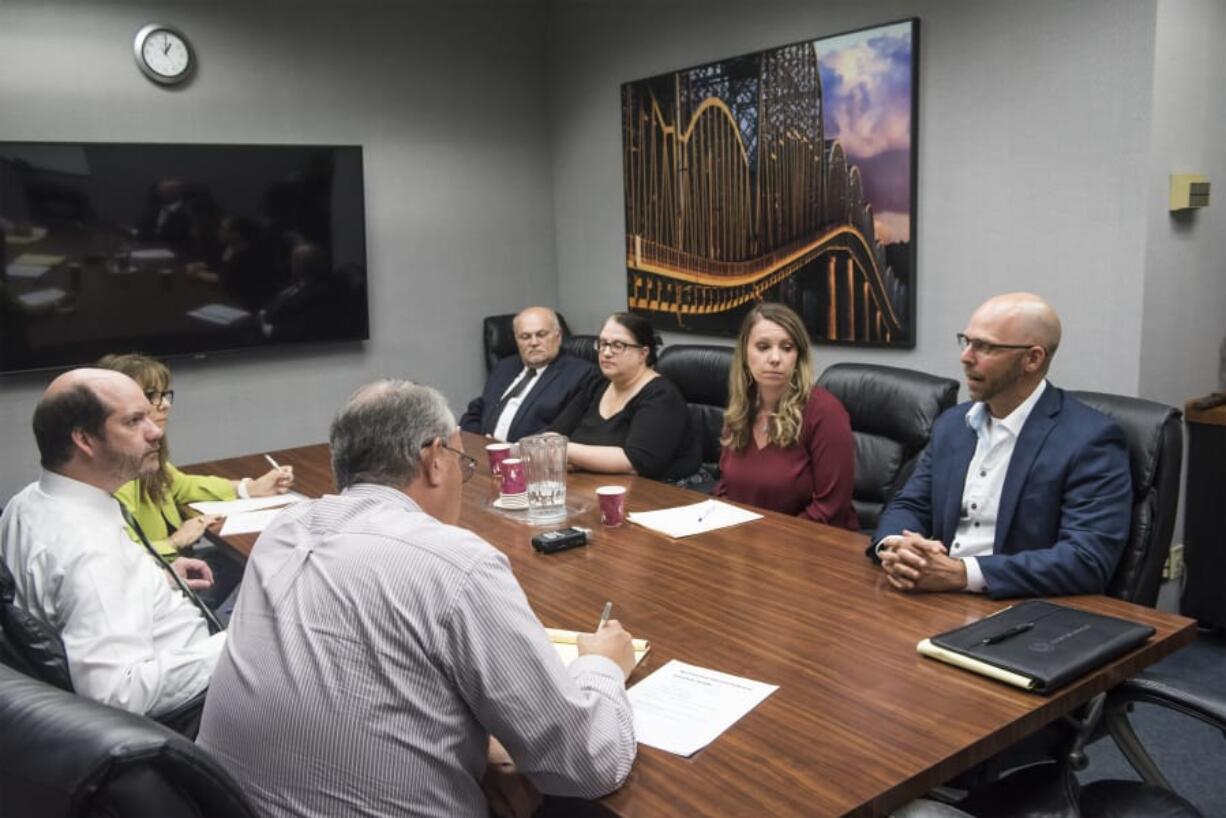 Candidates for Vancouver Public School Board of Directors Pos. 5, Scott Dalesandro, from left, Jennifer Hawks-Conright, Tracie Barrows and Chris Lewis meet with The Columbian’s Editorial Board last week. The candidates outlined their visions and priorities for Clark County’s second-largest school district during the meeting.