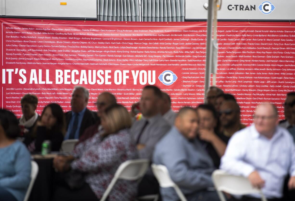 C-Tran hangs a banner with every C-Tran employeeÕs name on it, totaling 463, for the special event at the C-Tran offices in Vancouver on July 9, 2019. C-Tran revealed that The American Public Transportation Association has selected the company as its Transit System of the Year for 2019.