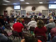 Vancouver Public Schools board members listens to public comment during a Tuesday meeting.