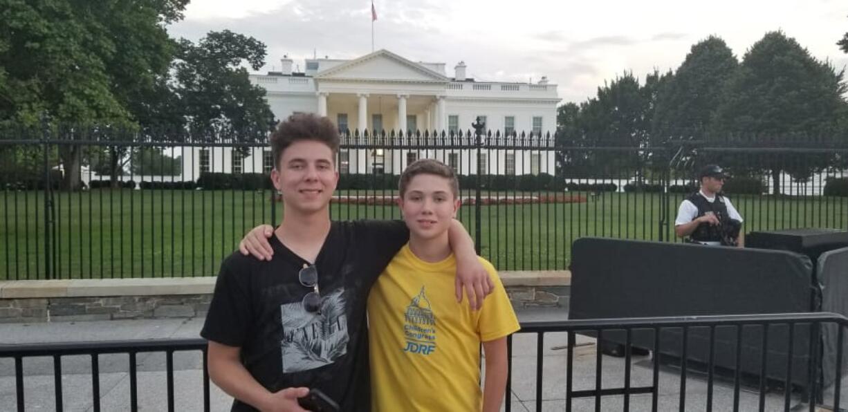 Anthony Ross, left, and his brother Austin pose outside the White House. The brothers have Type 1 diabetes and have advocated for patients at Children’s Congress in Washington, D.C.