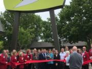 Central Vancouver: David Reiter, senior vice president at Bank of America, and Suzanne Washington, chief executive officer of Meals on Wheels People, cut the ribbon with the Vancouver Chamber of Commerce for The Diner Vancouver’s grand opening.