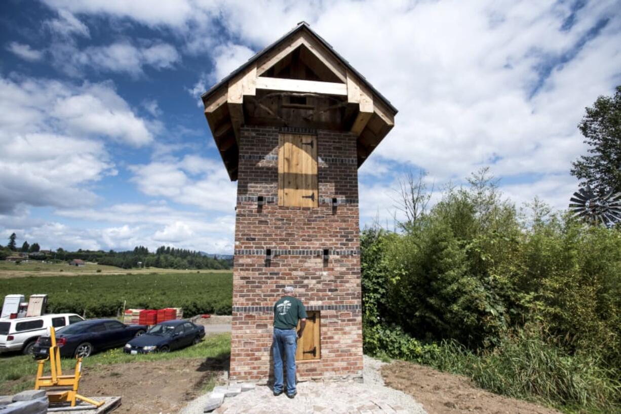 William Doty, owner of Fargher Lake Store, opens the bottom door to the new wildlife tower on his property on Thursday afternoon.