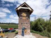 William Doty, owner of Fargher Lake Store, opens the bottom door to the new wildlife tower on his property on Thursday afternoon.