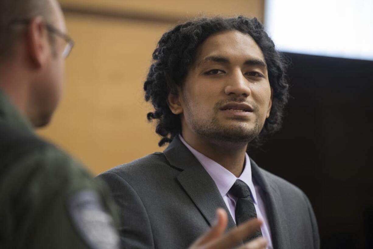 Thomas Leae confronts a member of the media after he was found guilty in the 2015 robbery and shooting death of a Vancouver precious metals shop employee Wednesday in Clark County Superior Court.