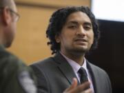 Thomas Leae confronts a member of the media after he was found guilty in the 2015 robbery and shooting death of a Vancouver precious metals shop employee Wednesday in Clark County Superior Court.