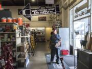 Randal Bernhardt, a longshoreman at the Port of Vancouver and a customer at Vancouver Bolt & Supply for 30 years, looks through the store’s merchandise at the firm’s 40th anniversary sale.