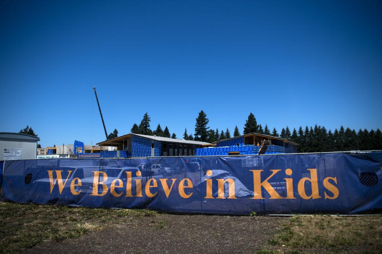 Construction continues at McLoughlin Middle School and Marshall Elementary School in Vancouver on Monday.  The new schools are expected to be complete in 2020.