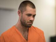 Daniel Scott Berry, 33, of Vancouver makes a first appearance Tuesday morning in Clark County Superior Court on suspicion of vehicular homicide in connection with a fatal July 8 crash in Battle Ground.