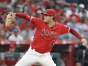 Los Angeles Angels starting pitcher Tyler Skaggs throws to the Oakland Athletics during the first inning of a baseball game Saturday, June 29, 2019, in Anaheim, Calif.