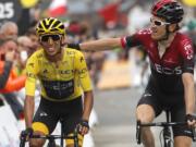 Britain's Geraint Thomas, right, congratulates Colombia's Egan Bernal wearing the overall leader's yellow jersey as they crosses the finish line of the 20th stage of the Tour de France cycling race over 59,5 kilometers (36,97 miles) with start in Albertville and finish in Val Thorens, France, Saturday, July 27, 2019.