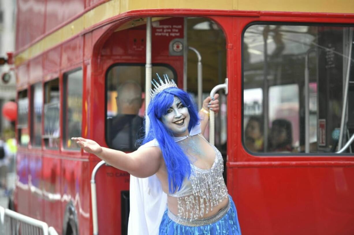 A reveller poses for a photo Saturday during the Pride in London Parade in London.