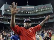 David Ortiz waves from the field at Fenway Park on Oct. 10, 2016. The former Red Sox slugger is out of the hospital following three surgeries after being shot in the back at a bar in the Dominican Republic.