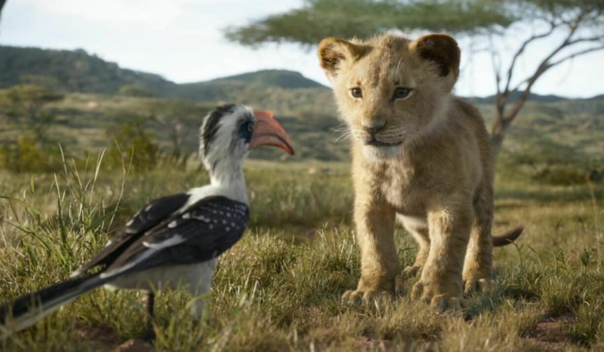 Zazu, voiced by John Oliver, and young Simba, voiced by JD McCrary, in a scene from “The Lion King.” Disney