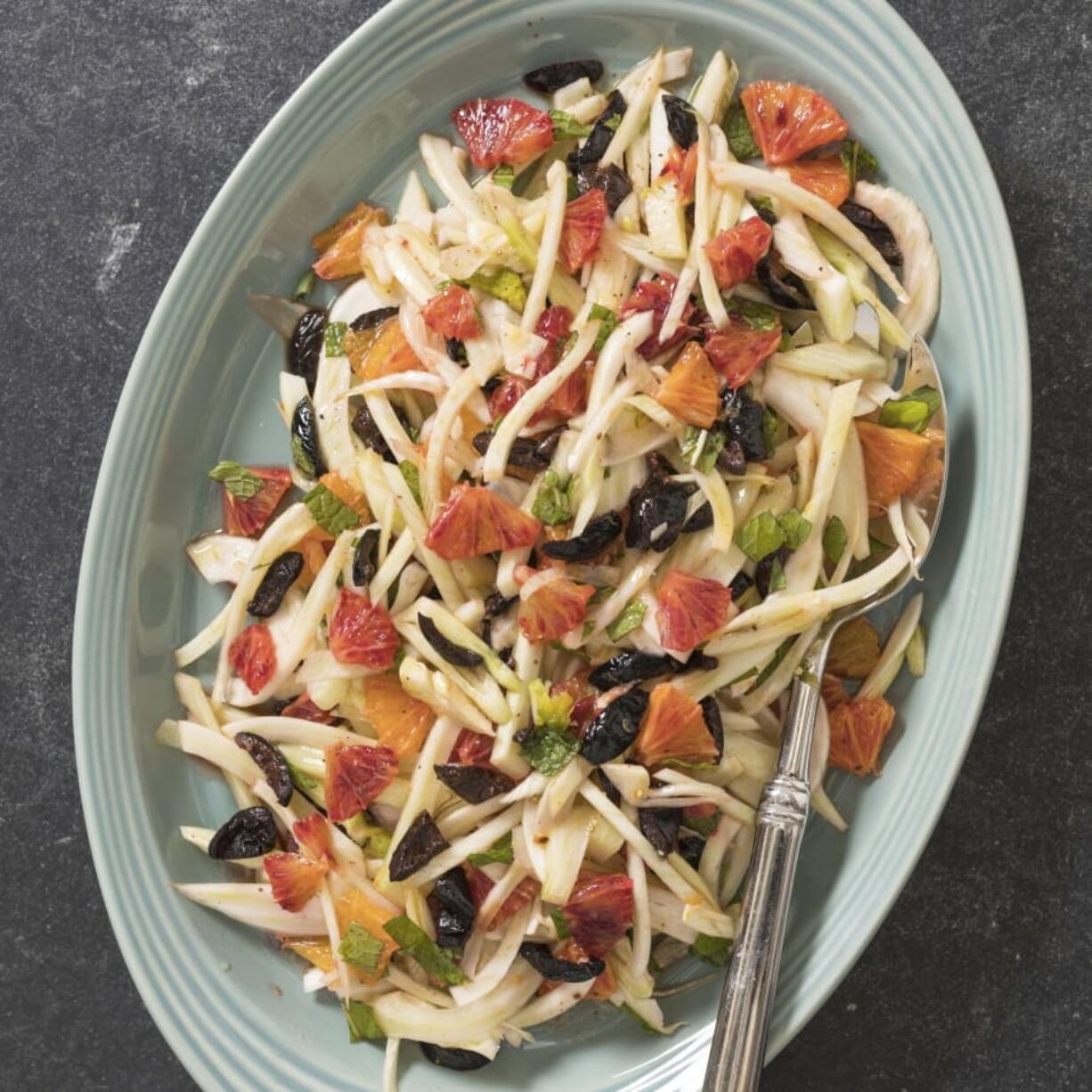 This undated photo provided by America’s Test Kitchen in June 2019 shows Fennel, Orange and Olive Salad in Brookline, Mass. This recipe appears in the cookbook “Tasting Italy.” (Daniel J.