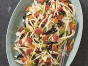 This undated photo provided by America’s Test Kitchen in June 2019 shows Fennel, Orange and Olive Salad in Brookline, Mass. This recipe appears in the cookbook “Tasting Italy.” (Daniel J.