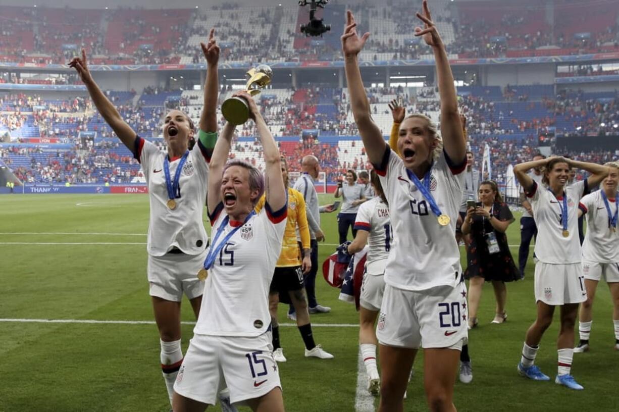 United States’ Megan Rapinoe , center left, celebrates with teammates their victory in the Women’s World Cup final soccer match between US and The Netherlands at the Stade de Lyon in Decines, outside Lyon, France, Sunday, July 7, 2019. US won 2:0.