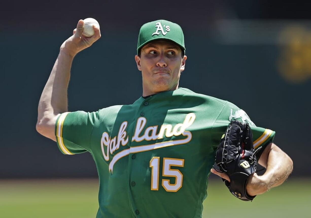 Oakland Athletics pitcher Homer Bailey works against the Seattle Mariners in the first inning of a baseball game Wednesday, July 17, 2019, in Oakland, Calif.