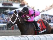 In this image provided by Bill Denver/EQUI-PHOTO, Inc., Maximum Security (7), ridden by Luis Saez, wins the Grade I - $1,000,000 TVG.com Haskell Invitational horse race Saturday, July 20, 2019, at Monmouth Park Racetrack in Oceanport, N.J. (Bill Denver/EQUI-PHOTO, Inc.