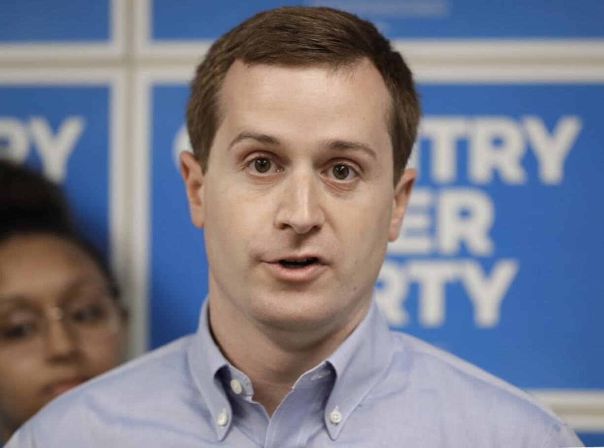 FILE - In this May 15, 2019, file photo, Ninth Congressional district Democratic candidate Dan McCready answers a question during a news conference in Charlotte, N.C. The North Carolina Democrat in a U.S. House special election plans to propose broadly increasing national service programs to better tie the country together. McCready makes his pitch Wednesday, July 17, 2019 in suburban Charlotte alongside retired U.S. Army four-star general Stanley McChrystal.