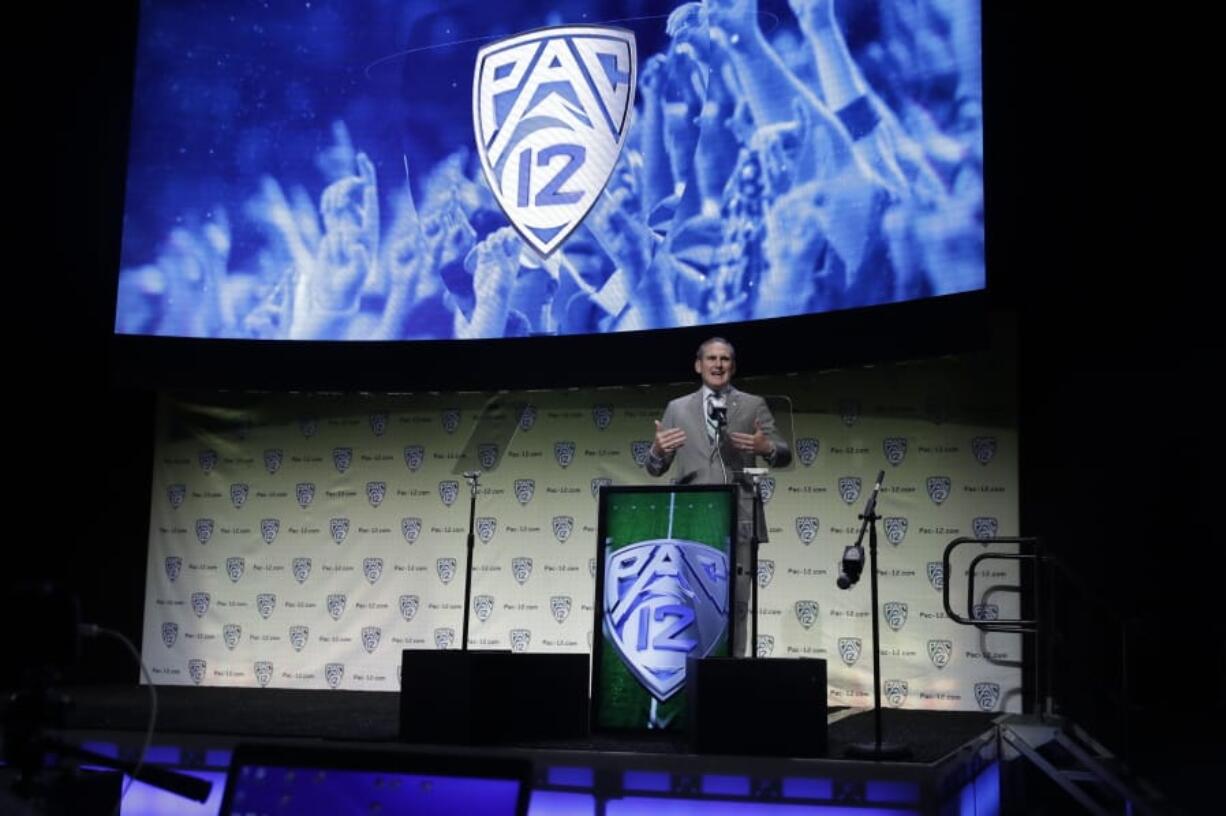 Pac-12 Conference Commissioner Larry Scott speaks during the Pac-12 Conference NCAA college football Media Day Wednesday, July 24, 2019, in Los Angeles.