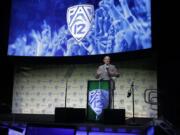 Pac-12 Conference Commissioner Larry Scott speaks during the Pac-12 Conference NCAA college football Media Day Wednesday, July 24, 2019, in Los Angeles.