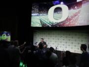 Oregon head coach Mario Cristobal answers questions during the Pac-12 Conference NCAA college football Media Day Wednesday, July 24, 2019, in Los Angeles.