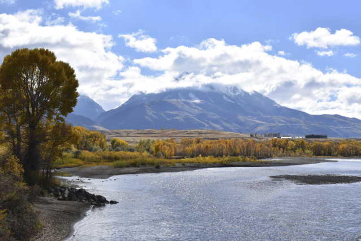 In this Oct. 8, 2018 file photo, emigrant Peak is seen rising above the Paradise Valley and the Yellowstone River near Emigrant, Mont. The Trump administration has put a conservative advocate who argues for selling off the nation’s public lands in charge of the nation’s 250 million public acres. Interior Secretary David Bernhardt on Monday signed an order making William Perry Pendley acting head of the Bureau of Land Management, putting the lawyer and Wyoming native in charge of public lands and their resources.