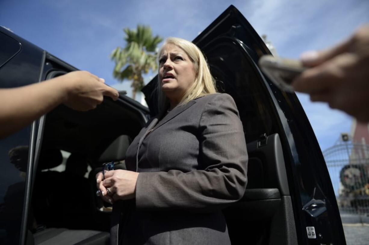 Then Puerto Rico Justice Secretary Wanda Vazquez answers reporters’ questions Jan. 16, 2018, in San Juan, Puerto Rico.