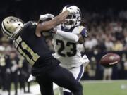 Los Angeles Rams’ Nickell Robey-Coleman breaks up a pass intended for New Orleans Saints’ Tommylee Lewis during the second half of the NFC championship game on Jan. 20, 2019, in New Orleans. A Louisiana judge has ordered that NFL Commissioner Roger Goodell and three officials from that game be questioned under oath in September about an infamous “no-call” that helped the Los Angeles Rams beat the New Orleans Saints in January’s NFC title game, an attorney said Monday, July 29, 2019.