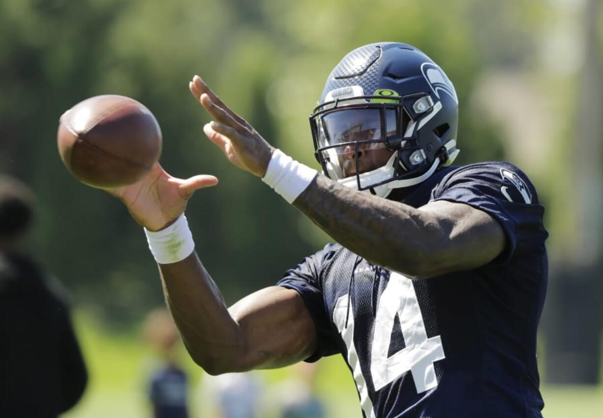 In this photo taken July 25, 2019, Seattle Seahawks wide receiver DK Metcalf makes a catch during NFL football training camp in Renton, Wash. (AP Photo/Ted S.