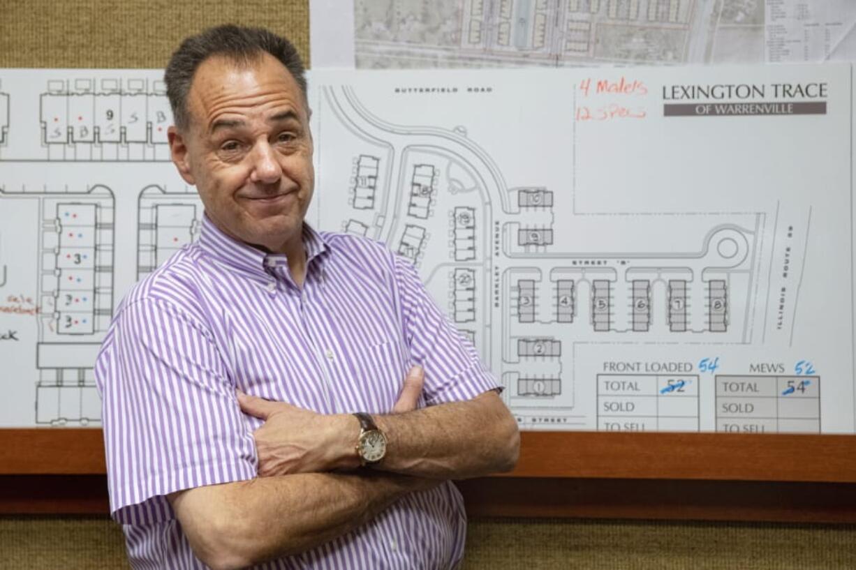 Jeff Benach, co-owner of Lexington Homes, poses for a portrait inside his office in Chicago.