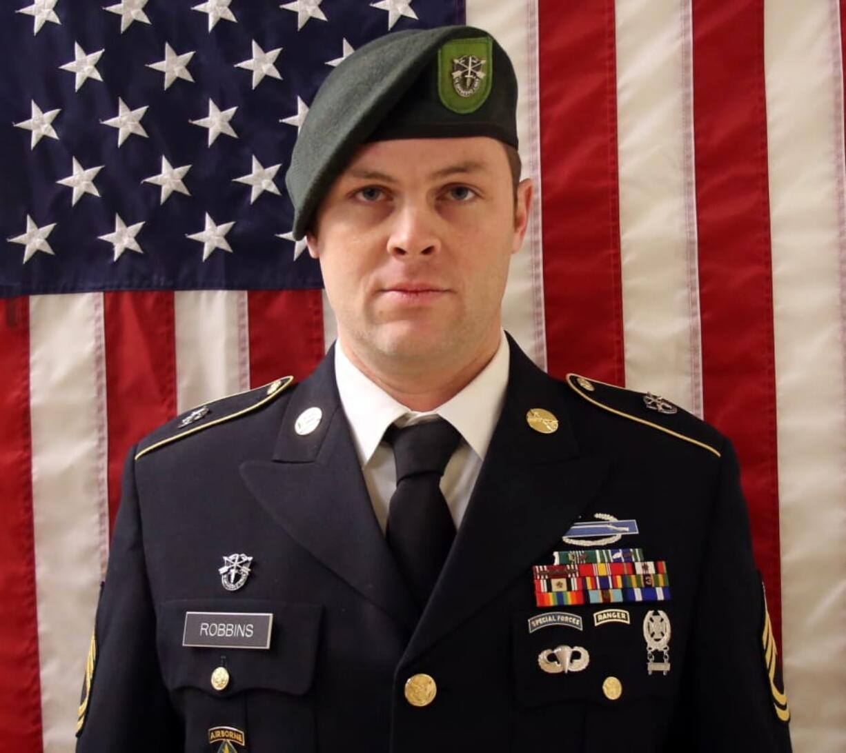 This undated image provided by the U.S. Army shows Sgt. 1st Class Elliott J. Robbins, who died Sunday, June, 30, 2019, of non-combat injuries in the Helmand Province of Afghanistan. Robbins, 31, from Ogden, Utah, and was assigned to the 10th Special Forces Group. (U.S.