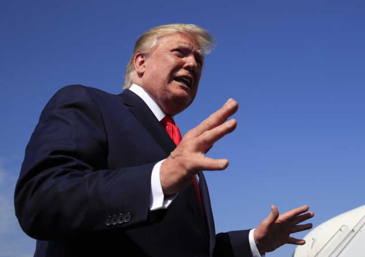 President Donald Trump speaks at Morristown Municipal Airport in Morristown, N.J., on his way returning back to the White House, Sunday, July 7, 2019.