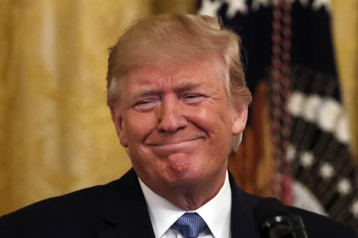 President Donald Trump pauses as he speaks during an event about the environment Monday in the East Room of the White House.