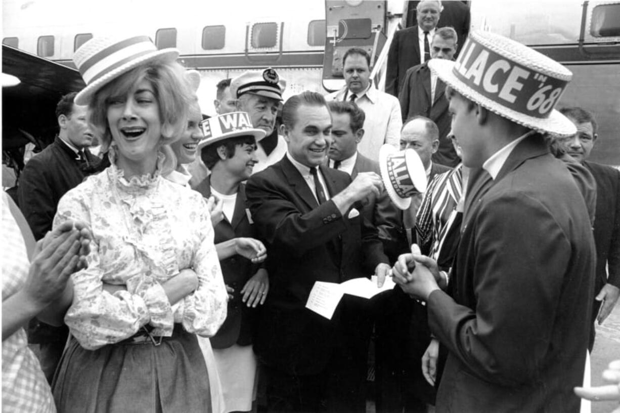 FILE - In this June 28,1968 file photo, presidential candidate, former Alabama Gov, George Wallace arrives in Boston. If President Donald Trump making racism a cornerstone of his reeleciton campaign sounds familiar, that’s because another presidential candidate did the same half a century ago. And George Wallace saw the strategy resonate with many. Wallace was elected governor of Alabama in 1962 and declared, “Segregation now. Segregation tomorrow.