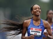 Dalilah Muhammad smiles as she wins the women’s 400-meter hurdles at the U.S. Championships athletics meet, Sunday, July 28, 2019, in Des Moines, Iowa.