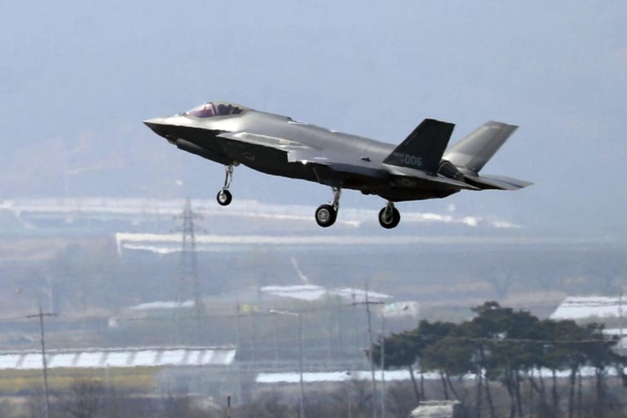 FILE - In this March 29, 2019, photo, a U.S. F-35A fighter jet prepares to land at Chungju Air Base in Chungju, South Korea. The White House says Turkey can no longer be part of the American F-35 fighter jet program.