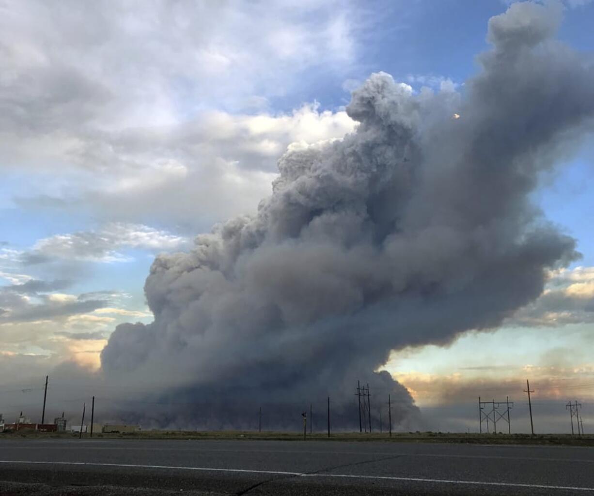 This photo provided by the U.S. Bureau of Land Management (BLM) shows wildfires burning in Idaho, Wednesday, July 24, 2019. The largest wildfire at the nation’s primary nuclear research facility in recent history had been burning close to buildings containing nuclear fuel and other radioactive material, but a change in wind direction Wednesday was pushing the flames into open range at the sprawling site in Idaho, officials said. The lightning-caused fire at the Idaho National Laboratory is one of several across the U.S. West.