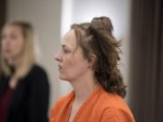 Ashley Lorraine Barry enters the courtroom May 8, 2017, after making a first appearance in Clark County Superior Court in connection with the slaying of Raymond C. Brandon, whose body was found in April 2017 in a shed at a Hockinson residence. Barry pleaded guilty Wednesday to first-degree manslaughter for her role in Brandon’s death.