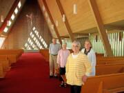 Grace Lutheran Church in Bellevue closed this year due to waning attendance. Among the remaining church members are Howard Johnson, from left, and his wife, Judy Johnson, Gail DíAlessio and Marcia Bodin.