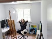 Erica Eriksdotter pauses for a moment while working in her home studio July 28 in Reston, Va.