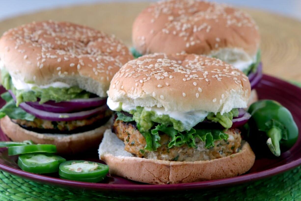 Cheddar jalapeño chicken burgers with guacamole Hillary Levin/St.