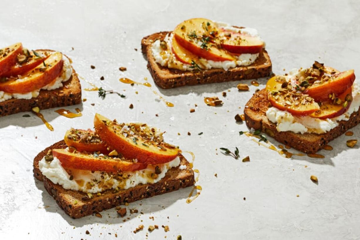 Ricotta Toasts With Peaches and Pistachios. MUST CREDIT: Photo by Tom McCorkle for The Washington Post.