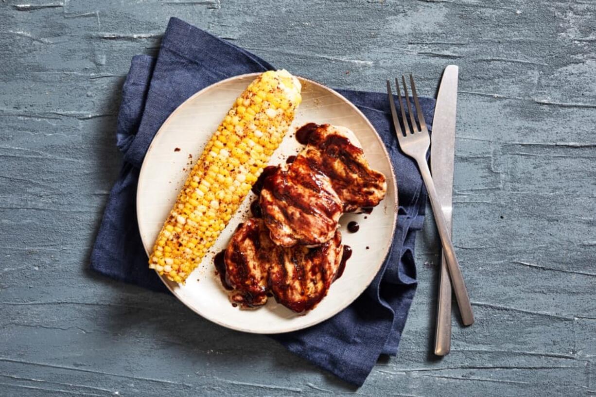 Grilled Chicken Thighs With Blueberry Barbecue Sauce.