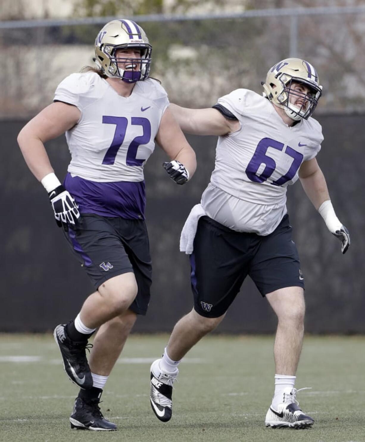 Trey Adams (72) has overcome numerous setbacks and injuries, but will start for the Huskies in the season opener.