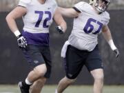 Trey Adams (72) has overcome numerous setbacks and injuries, but will start for the Huskies in the season opener.