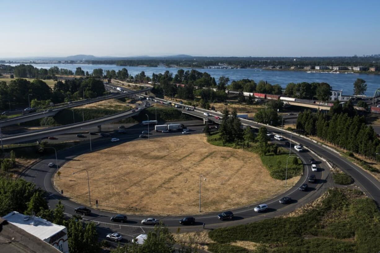 Traffic moves around the partial cloverleaf interchange from state Highway 14 onto southbound Interstate just north of the Interstate Bridge in Vancouver.