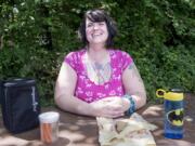 Heather Fisher of Vancouver strives to reduce garbage. She packed her lunch in reusable containers for a picnic at Hockinson Meadows Community Park, but wishes she could take her own containers to fill at the grocery store, a practice currently prohibited by Washington health codes. Proposed revisions would change that.